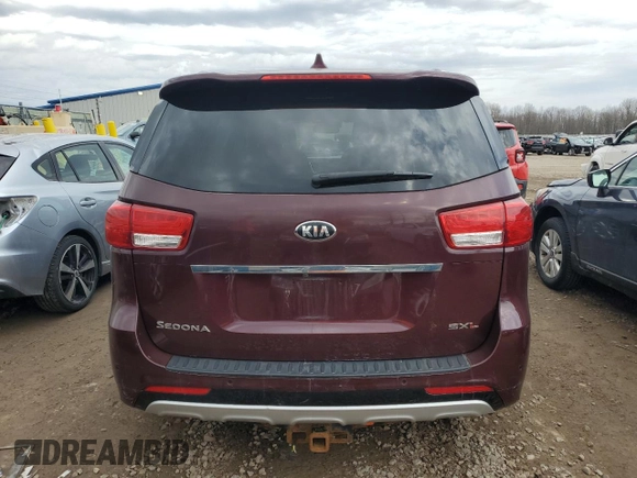 2016 Kia Sedona SX-L with VIN KNDME5C19G6138311, listed as a Copart auction lot 49214375 with 68,500 mi miles and Salvage Title. Bid and sale history available at carsss.com. Image 6.