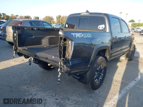 2022 Toyota Tacoma SR z VIN 3TMCZ5AN1NM531884, wystawiony jako IAAI lot #42257444 z przebiegiem Nie podano mil oraz . Historia ofert i sprzedaży dostępna na DreamBid. Obrazek 4.