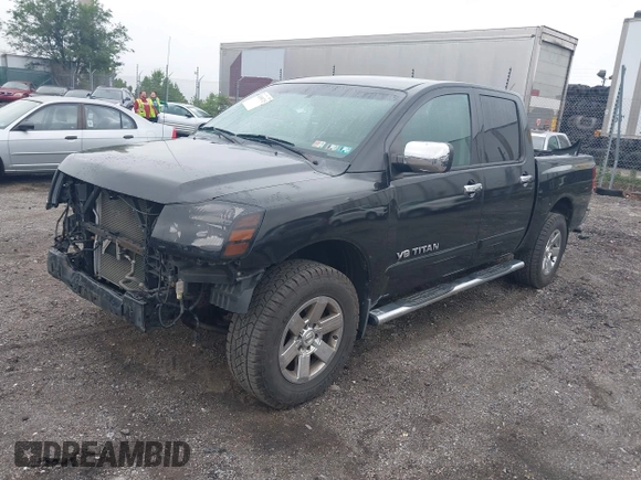 2011 Nissan Titan Pro-4X with VIN 1N6BA0ECXBN319157, listed as a IAAI auction lot 42456725 with 169,434 mi miles and . Bid and sale history available at DreamBid. Image 2.