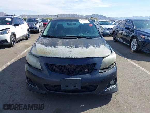2010 Toyota Corolla with VIN 1NXBU4EE2AZ299148, listed as a IAAI auction lot 41884899 with 303,174 mi miles. Bid and sale history available at carsss.com. Image 12.