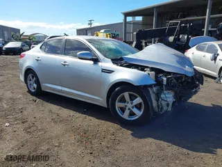 2015 Kia Optima LX with VIN 5XXGM4A74FG476636, listed as a IAAI auction lot 41242478 with 1 mi miles. Bid and sale history available at carsss.com. Image 1.