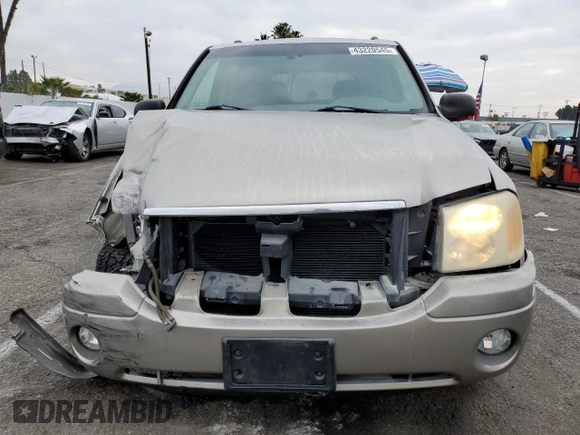 2003 GMC Envoy SLE with VIN 1GKDS13S232236886, listed as a Copart auction lot 43220545 with 58,229 mi miles and Salvage Title. Bid and sale history available at carsss.com. Image 5.