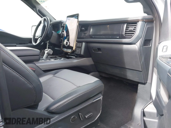 2023 Ford F-150 Lightning Pro with VIN 1FTVW1EV3PWG60491, listed as a IAAI auction lot 41507485 with 19,148 mi miles and . Bid and sale history available at DreamBid. Image 5.