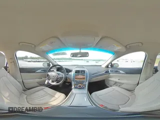 2017 Lincoln MKZ Select z VIN 3LN6L5C97HR649682, wystawiony jako Copart lot #55233965 z przebiegiem 104 727 mil mil oraz Szkoda całkowita • Salvage title. Historia ofert i sprzedaży dostępna na DreamBid. Obrazek 14.