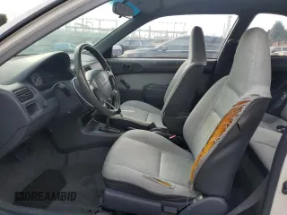 1996 Toyota Tercel DX z VIN JT2AC52L9T0189356, wystawiony jako Copart lot #75311564 z przebiegiem 155 248 mil mil oraz Szkody całkowita. Historia ofert i sprzedaży dostępna na DreamBid. Obrazek 7.