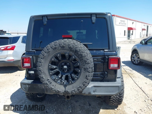 2020 Jeep Wrangler Unlimited Sport S z VIN 1C4HJXDN9LW323205, wystawiony jako IAAI lot #41879292 z przebiegiem 108 499 mil mil oraz . Historia ofert i sprzedaży dostępna na DreamBid. Obrazek 16.