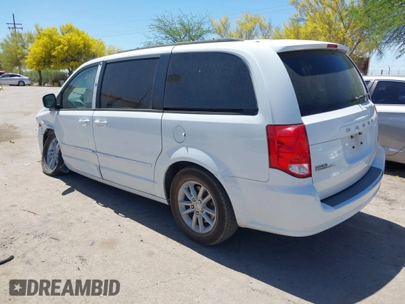 2014 Dodge Grand Caravan SXT with VIN 2C4RDGCG1ER429495, listed as a IAAI auction lot 42058513 with 136,936 mi miles and . Bid and sale history available at DreamBid. Image 3.