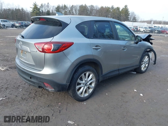 2013 Mazda CX-5 Grand Touring with VIN JM3KE4DE2D0115154, listed as a IAAI auction lot 41706007 with 153,532 mi miles. Bid and sale history available at carsss.com. Image 4.