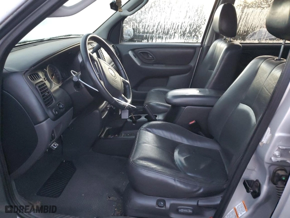 2003 Mazda Tribute ES with VIN 4F2CZ96133KM16575, listed as a Copart auction lot 87240694 with 125,656 mi miles and Salvage Title. Bid and sale history available at carsss.com. Image 7.