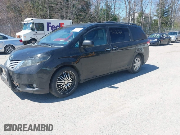 2011 Toyota Sienna XLE with VIN 5TDDK3DC8BS011975, listed as a IAAI auction lot 42112522 with 124,251 mi miles. Bid and sale history available at carsss.com. Image 2.