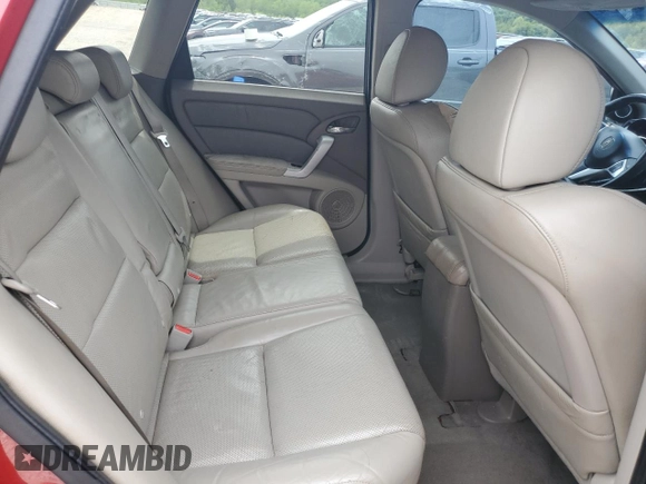 2007 Acura RDX Technology z VIN 5J8TB18547A008802, wystawiony jako Copart lot #55968235 z przebiegiem 108 575 mil mil oraz Szkoda całkowita • Salvage title. Historia ofert i sprzedaży dostępna na DreamBid. Obrazek 11.
