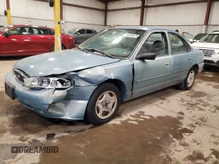 1998 Ford Contour LX with VIN 1FALP6535WK174891, listed as a Copart auction lot 44895625 with 121,579 mi miles and Salvage Title. Bid and sale history available at DreamBid. Image 1.