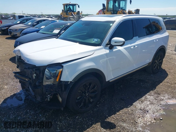 2021 Kia Telluride S with VIN 5XYP64HC1MG190118, listed as a IAAI auction lot 42078715 with 83,405 mi miles and . Bid and sale history available at DreamBid. Image 2.