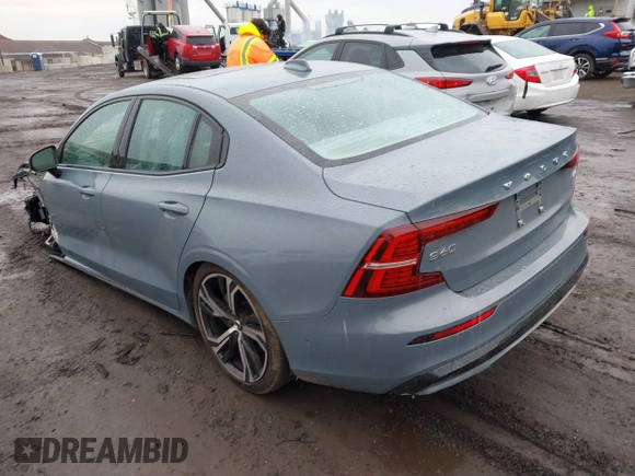 2024 Volvo S60 Plus Dark Theme with VIN 7JRL12TL5RG289457, listed as a IAAI auction lot 41657372 with 1,640 mi miles and . Bid and sale history available at DreamBid. Image 3.