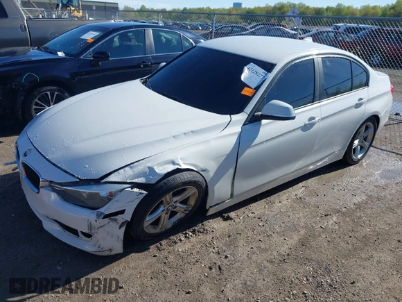 2015 BMW 3 Series 320i with VIN WBA3B1G57FNT02019, listed as a IAAI auction lot 42128277 with 218,621 mi miles and . Bid and sale history available at DreamBid. Image 2.