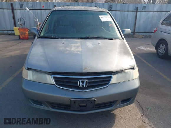 2002 Honda Odyssey EX z VIN 5FNRL186X2B014652, wystawiony jako IAAI lot #41950225 z przebiegiem 286 959 mil mil oraz . Historia ofert i sprzedaży dostępna na DreamBid. Obrazek 6.