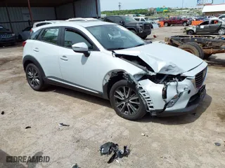 2017 Mazda CX-3 Grand Touring with VIN JM1DKFD78H0160564, listed as a IAAI auction lot 39236942 with 50,921 mi miles. Bid and sale history available at carsss.com. Image 1.