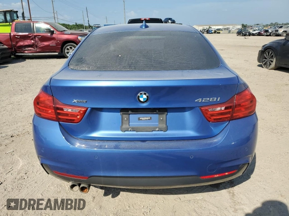 2015 BMW 4 Series 428i xDrive with VIN WBA4C9C5XFG135004, listed as a Copart auction lot 60551714 with 209,083 mi miles and Salvage Title. Bid and sale history available at DreamBid. Image 6.