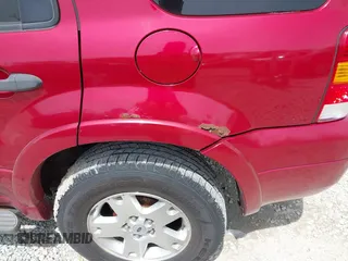 2007 Ford Escape XLT with VIN 1FMYU03117KB44940, listed as a IAAI auction lot 42148846 with 238,871 mi miles. Bid and sale history available at carsss.com. Image 6.
