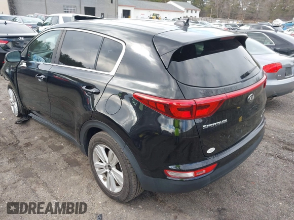 2017 Kia Sportage LX with VIN KNDPMCAC8H7186497, listed as a IAAI auction lot 41879470 with 147,190 mi miles and . Bid and sale history available at carsss.com. Image 3.