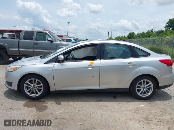 2016 Ford Focus SE with VIN 1FADP3F26GL351775, listed as a IAAI auction lot 42424733 with 164,886 mi miles and . Bid and sale history available at DreamBid. Image 14.