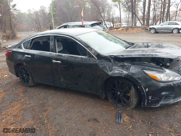 2018 Nissan Altima 2.5 SV with VIN 1N4AL3AP6JC244153, listed as a IAAI auction lot 41845407 with 54,486 mi miles. Bid and sale history available at carsss.com. Image 13.