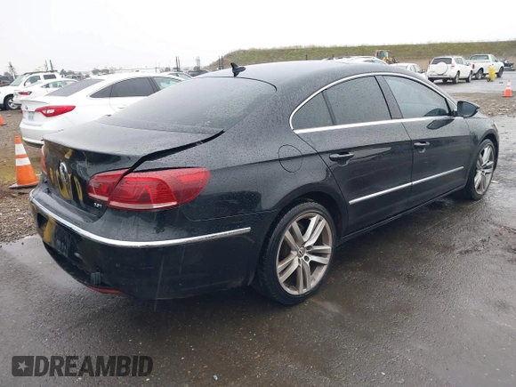 2013 Volkswagen CC Lux with VIN WVWRP7AN7DE510490, listed as a IAAI auction lot 41457328 with 154,443 mi miles. Bid and sale history available at carsss.com. Image 4.