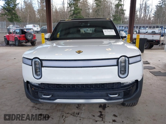 2024 Rivian R1S Adventure z VIN 7PDSGBBA4RN044260, wystawiony jako IAAI lot #41712342 z przebiegiem 7521 mil mil oraz . Historia ofert i sprzedaży dostępna na DreamBid. Obrazek 13.