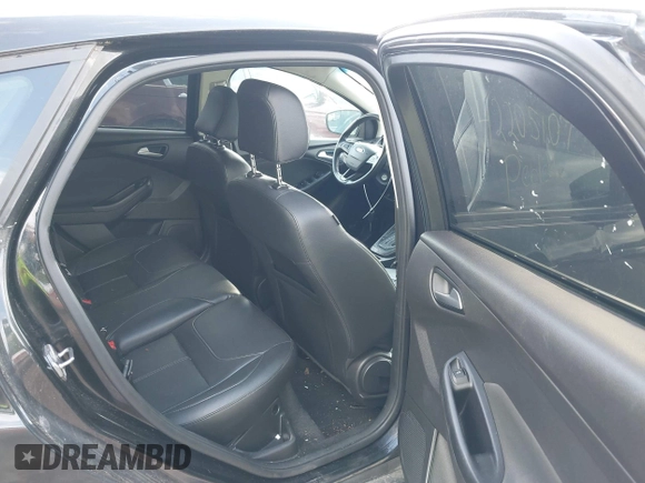 2015 Ford Focus SE with VIN 1FADP3K2XFL319559, listed as a IAAI auction lot 42205107 with 184,499 mi miles. Bid and sale history available at carsss.com. Image 8.