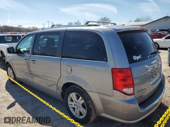 2013 Dodge Grand Caravan Crew with VIN 2C4RDGDG7DR795748, listed as a Copart auction lot 50329195 with 223,956 mi miles and Salvage Title. Bid and sale history available at DreamBid. Image 2.