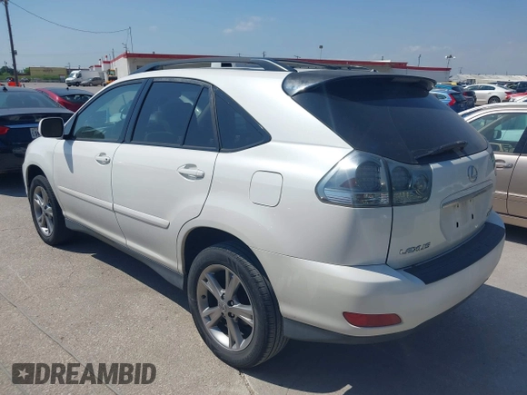 2006 Lexus RX 400h with VIN JTJHW31U560034896, listed as a IAAI auction lot 42053635 with 189,409 mi miles and . Bid and sale history available at DreamBid. Image 3.