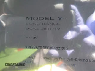 2023 Tesla Model Y Long Range with VIN 7SAYGDEE3PA201719, listed as a IAAI auction lot 42048816 with Not Provided miles and . Bid and sale history available at DreamBid. Image 7.