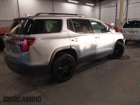 2023 GMC Acadia SLT with VIN 1GKKNULS7PZ133802, listed as a IAAI auction lot 41266532 with 22,214 mi miles and . Bid and sale history available at DreamBid. Image 4.