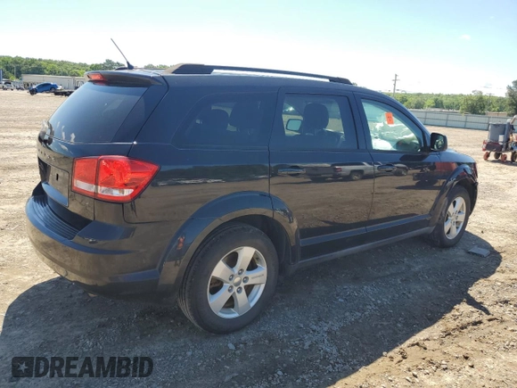 2013 Dodge Journey SE with VIN 3C4PDCAB5DT729415, listed as a Copart auction lot 55851915 with 128,782 mi miles and Salvage title. Bid and sale history available at DreamBid. Image 3.