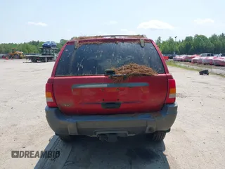 2001 Jeep Grand Cherokee Laredo z VIN 1J4GW48S11C720055, wystawiony jako IAAI lot #42453532 z przebiegiem 158 486 mil mil oraz . Historia ofert i sprzedaży dostępna na DreamBid. Obrazek 15.