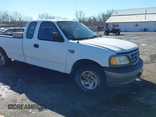 2002 Ford F-150 XL with VIN 1FTRX17L72NA76720, listed as a IAAI auction lot 41738935 with 92,506 mi miles. Bid and sale history available at carsss.com. Image 1.