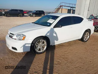 2014 Dodge Avenger SE with VIN 1C3CDZAB6EN180864, listed as a IAAI auction lot 41855043 with 99,977 mi miles. Bid and sale history available at carsss.com. Image 2.