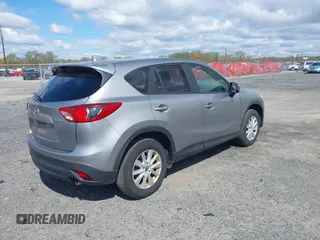 2013 Mazda CX-5 Touring with VIN JM3KE4CE5D0125470, listed as a IAAI auction lot 42051475 with 277,077 mi miles. Bid and sale history available at carsss.com. Image 4.