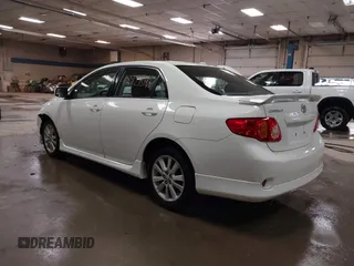 2010 Toyota Corolla with VIN 2T1BU4EEXAC448424, listed as a IAAI auction lot 41892816 with 158,538 mi miles. Bid and sale history available at carsss.com. Image 3.