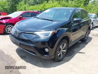 2018 Toyota RAV4 XLE with VIN 2T3WFREV3JW468450, listed as a IAAI auction lot 42528560 with 77,513 mi miles and . Bid and sale history available at DreamBid. Image 2.