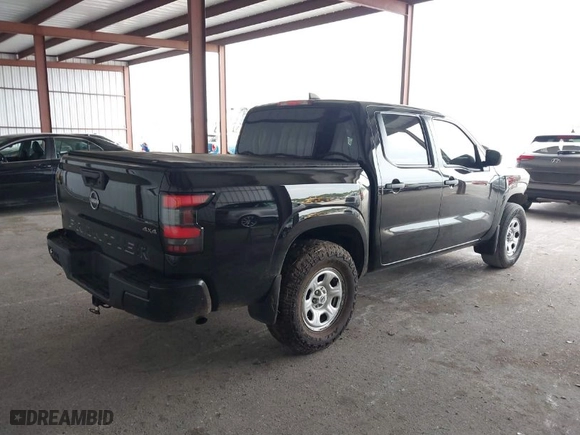 2022 Nissan Frontier PRO-4X with VIN 1N6ED1EK3NN655058, listed as a IAAI auction lot 41744009 with 70,823 mi miles. Bid and sale history available at carsss.com. Image 4.