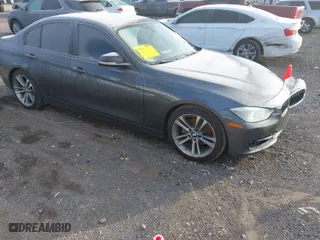 2015 BMW 3 Series 328i with VIN WBA3A5G55FNS87532, listed as a IAAI auction lot 41580190 with 154,901 mi miles. Bid and sale history available at carsss.com. Image 1.
