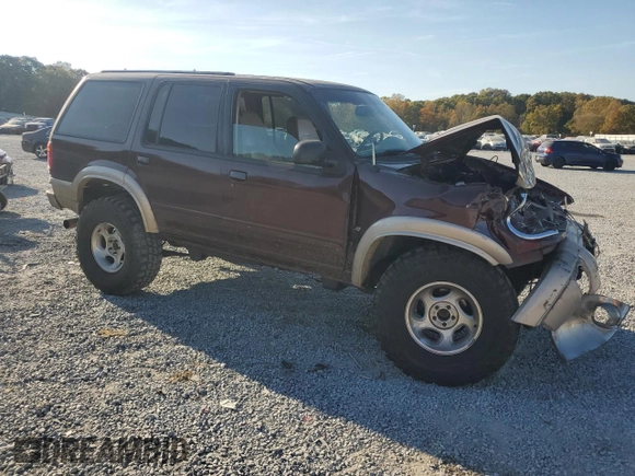 2000 Ford Explorer Eddie Bauer z VIN 1FMDU84P0YZB89831, wystawiony jako Copart lot #77874224 z przebiegiem 209 532 mil mil oraz Szkoda całkowita • Salvage title. Historia ofert i sprzedaży dostępna na DreamBid. Obrazek 4.