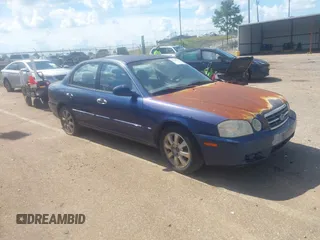 2005 Kia Optima LX z VIN KNAGD128255390165, wystawiony jako IAAI lot #42626972 z przebiegiem 165 524 mil mil oraz . Historia ofert i sprzedaży dostępna na DreamBid. Obrazek 1.