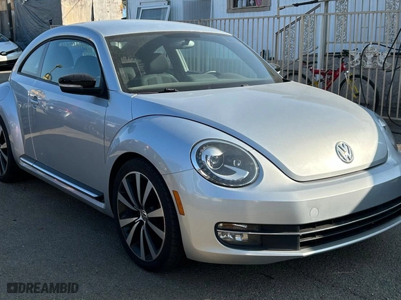 2012 Volkswagen Beetle 2.0T Turbo with VIN 3VW467AT8CM650890, listed as a Copart auction lot 83903324 with 105,476 mi miles and Clean Title. Bid and sale history available at carsss.com. Image 1.
