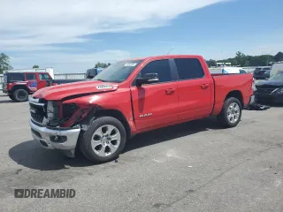 2022 Ram 1500 Lone Star with VIN 1C6RREFT1NN124615, listed as a Copart auction lot 56849265 with 89,947 mi miles and Salvage title. Bid and sale history available at DreamBid. Image 1.