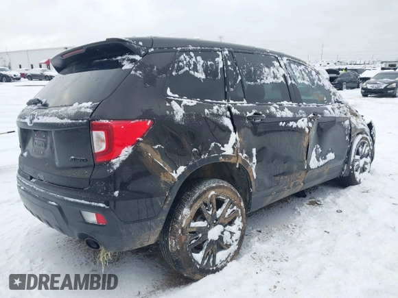 2019 Honda Passport Sport with VIN 5FNYF8H20KB019366, listed as a IAAI auction lot 41155033 with 79,250 mi miles and . Bid and sale history available at DreamBid. Image 4.