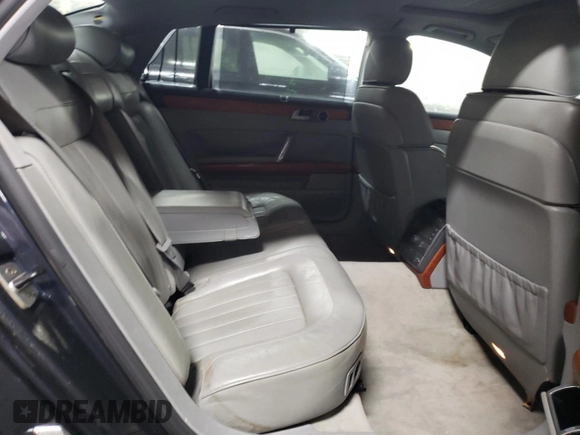 2004 Volkswagen Phaeton V8 z VIN WVWAF63D848008651, wystawiony jako Copart lot #78267004 z przebiegiem 146 193 mil mil oraz Szkody całkowita. Historia ofert i sprzedaży dostępna na DreamBid. Obrazek 10.