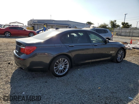 2011 BMW 7 Series 750i with VIN WBAKA8C58BCY37346, listed as a Copart auction lot 65017655 with 125,505 mi miles and Salvage title. Bid and sale history available at DreamBid. Image 3.