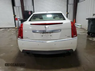 2012 Cadillac CTS Premium with VIN 1G6DS5E35C0120346, listed as a Copart auction lot 43354535 with 121,196 mi miles and Salvage Title. Bid and sale history available at DreamBid. Image 6.
